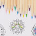 There are coloring pencils in a row at the top of the picture. Below them are three simple, half-colored mandalas.
